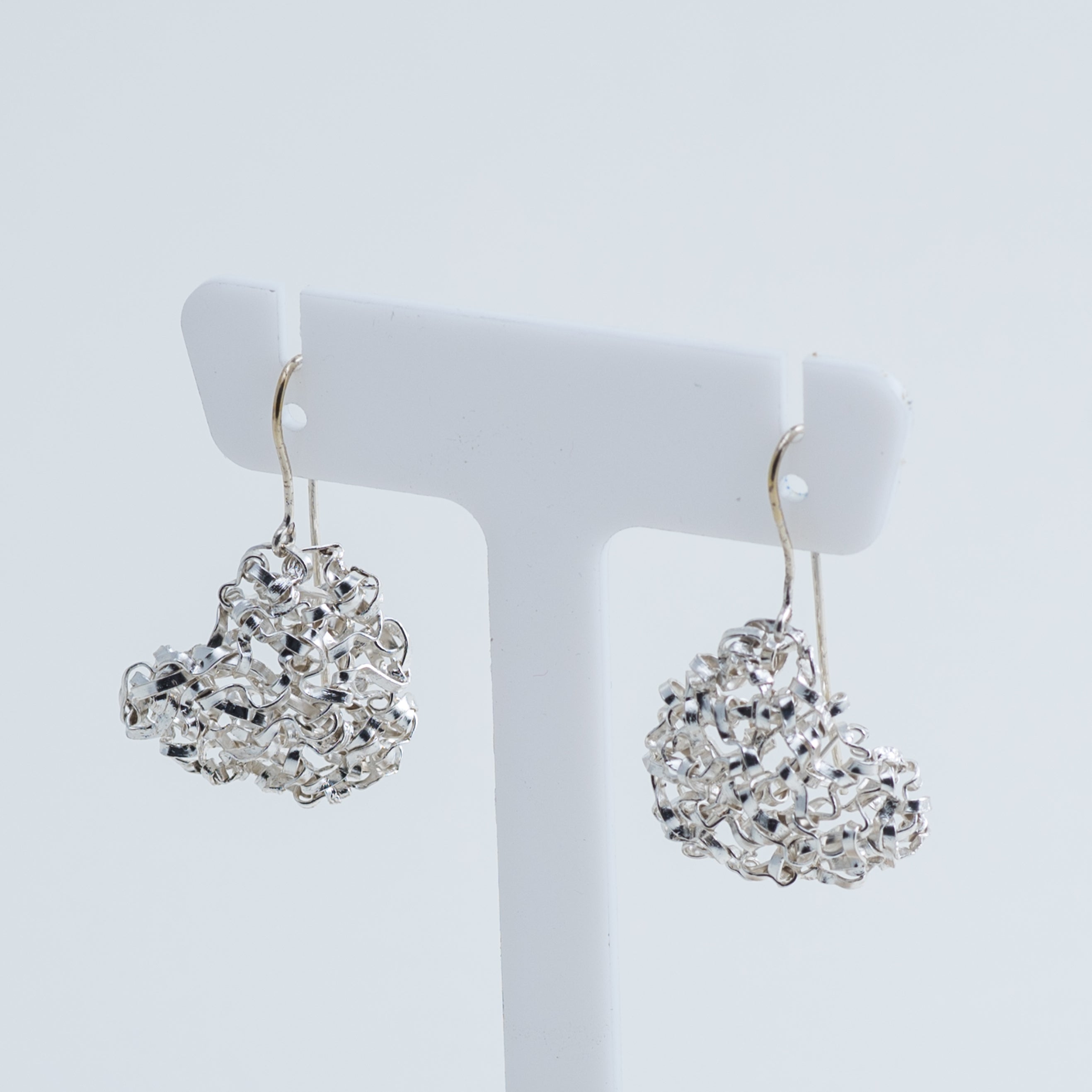 Boucles d'oreilles en forme de cœur entrelacé