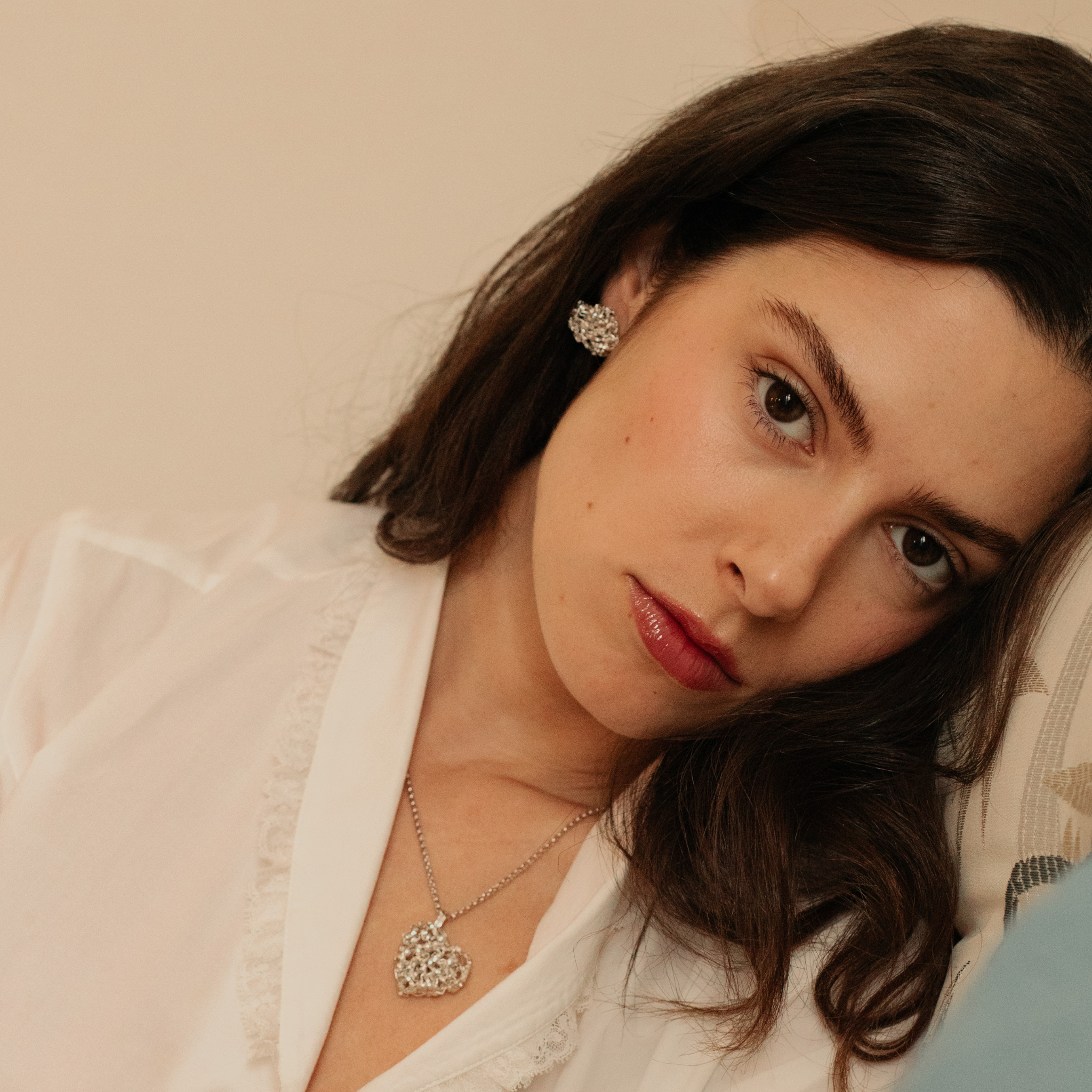 Collier pendentif mini cœur entrelacé